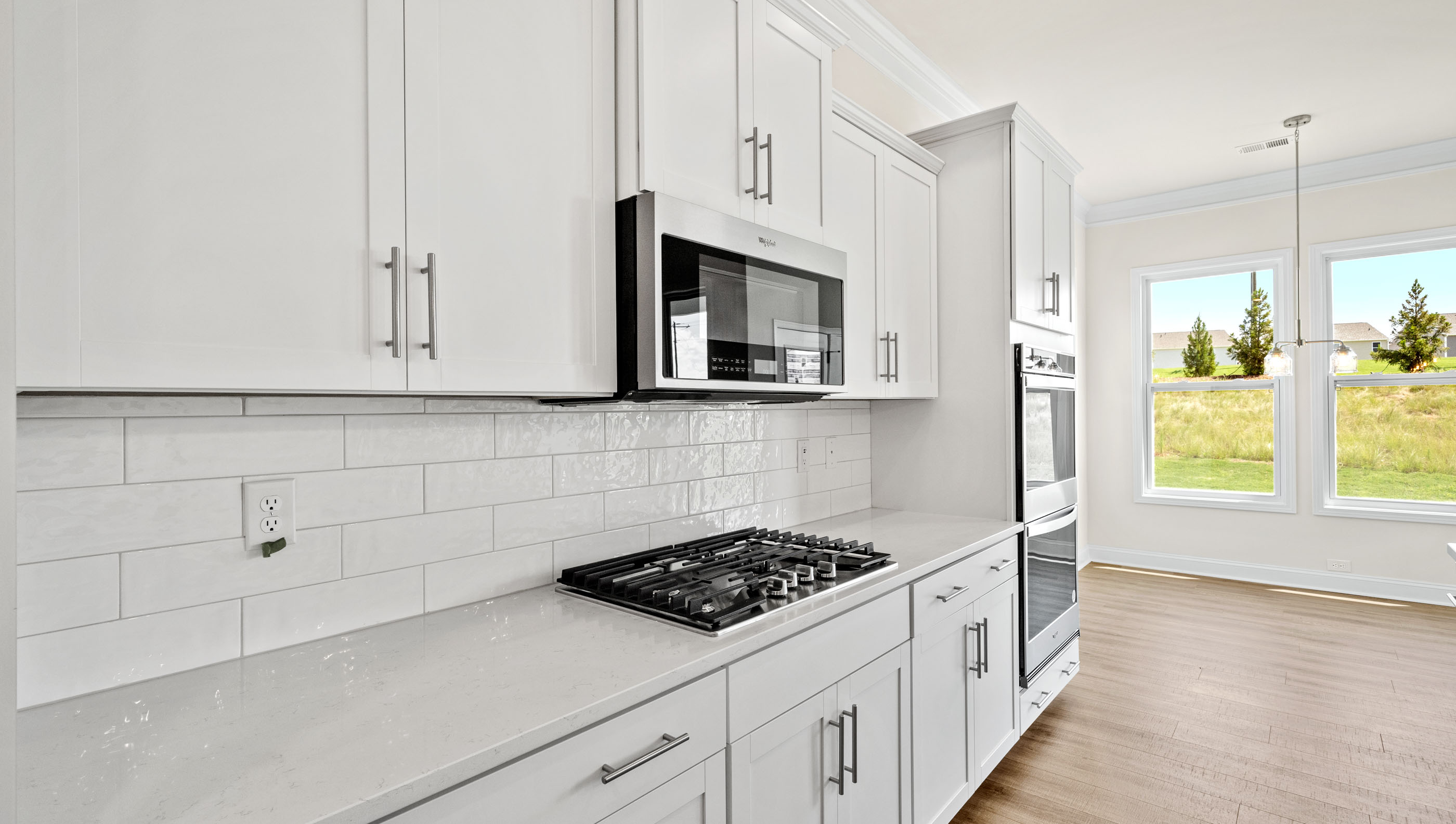 Kitchen with island and countertops.
