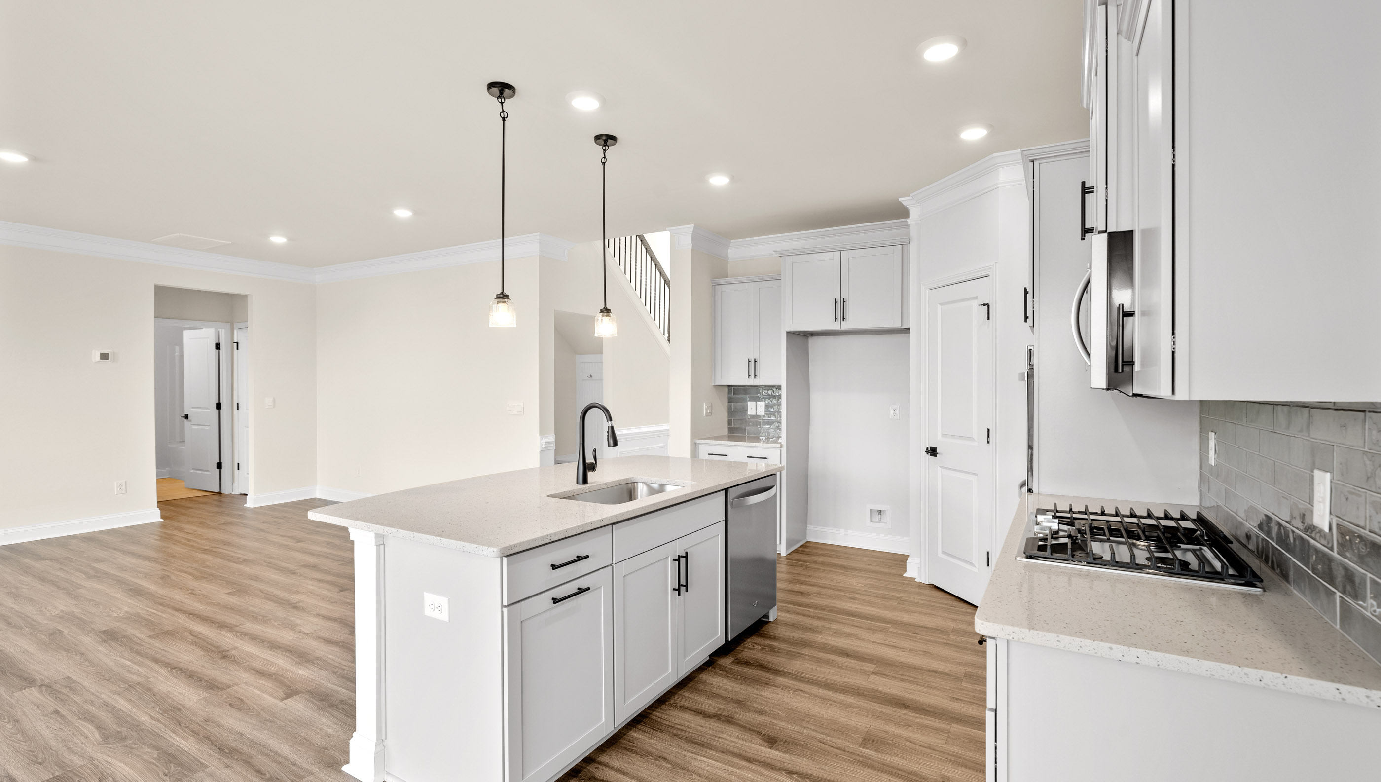 Kitchen with island and countertops.