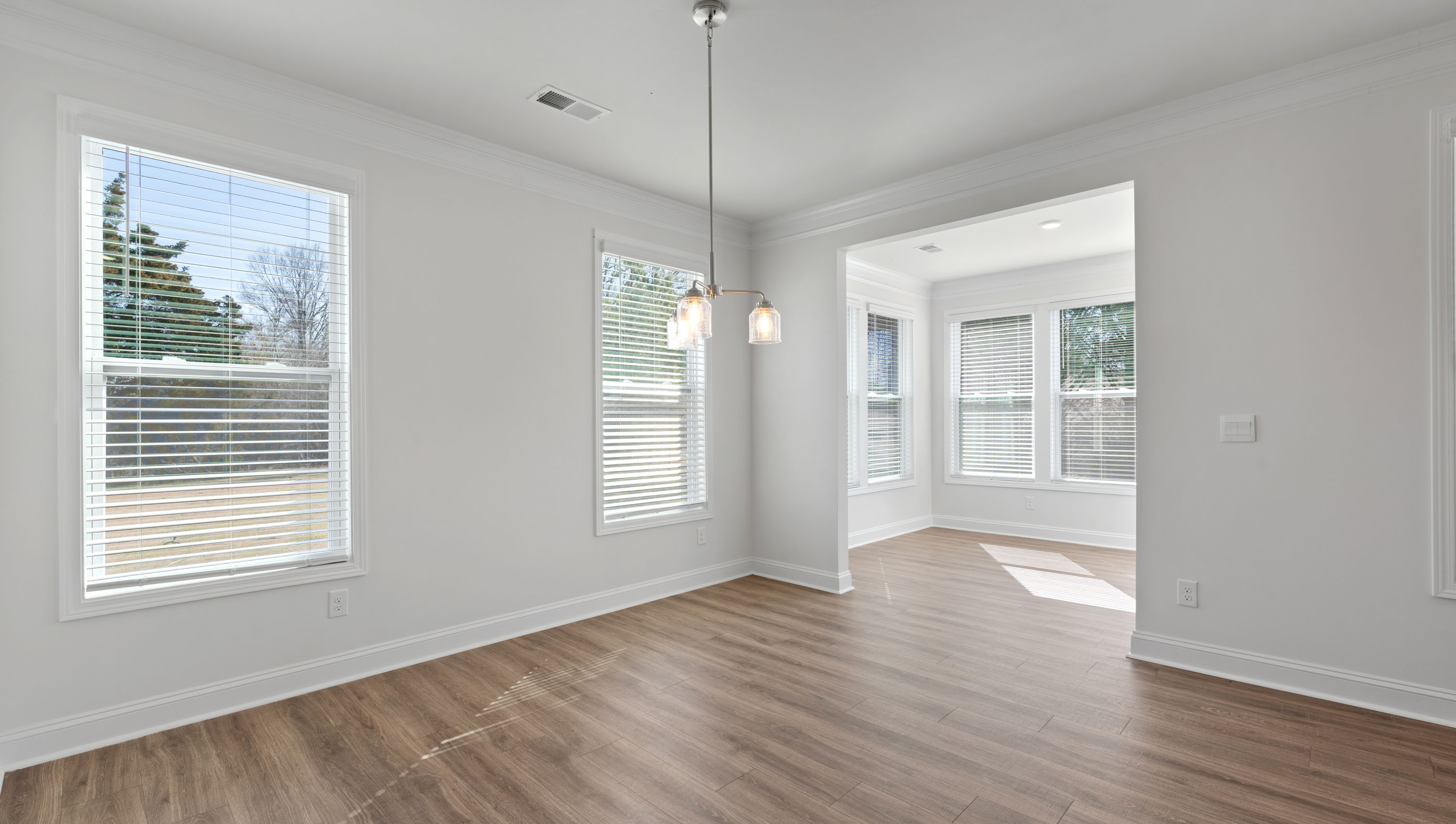 View of Sunroom from breakfast area.