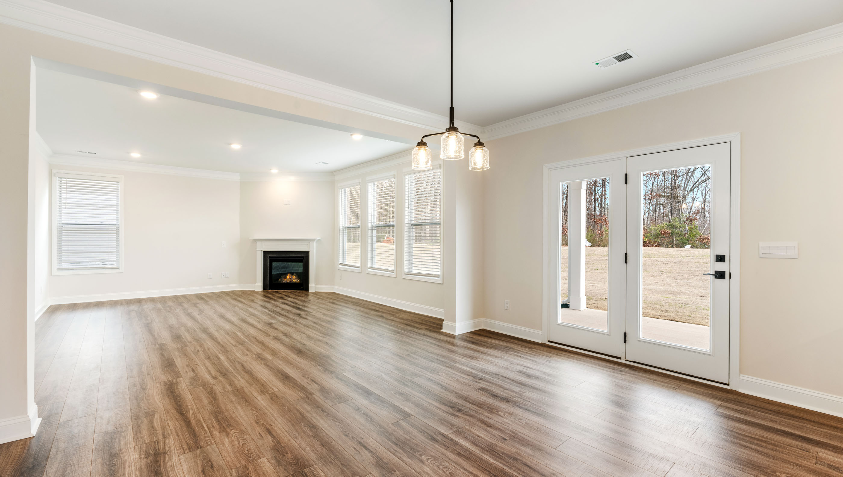 View of breakfast area and living room from kitchen.