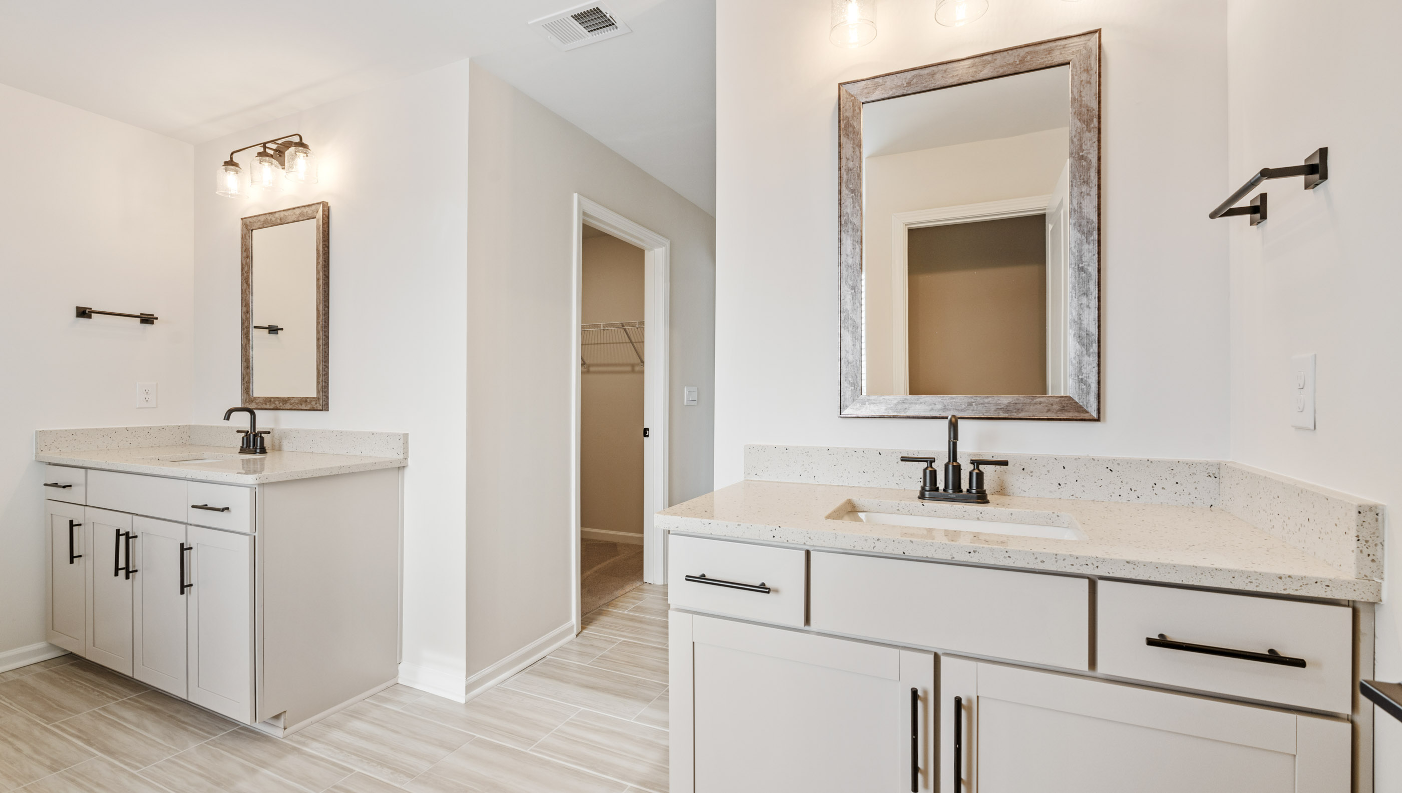 Bathroom with dual vanity.