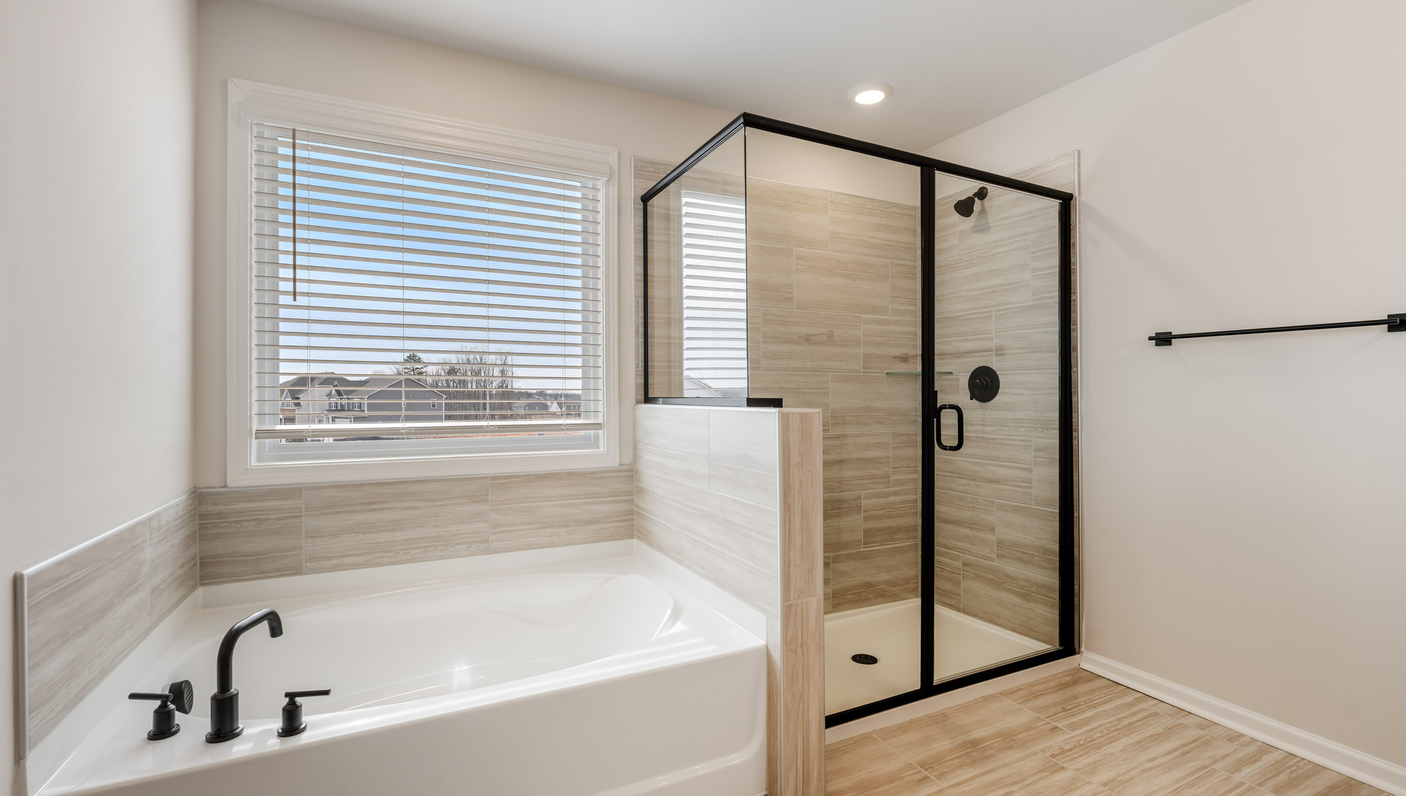 Bathroom with garden tub and walk in shower.