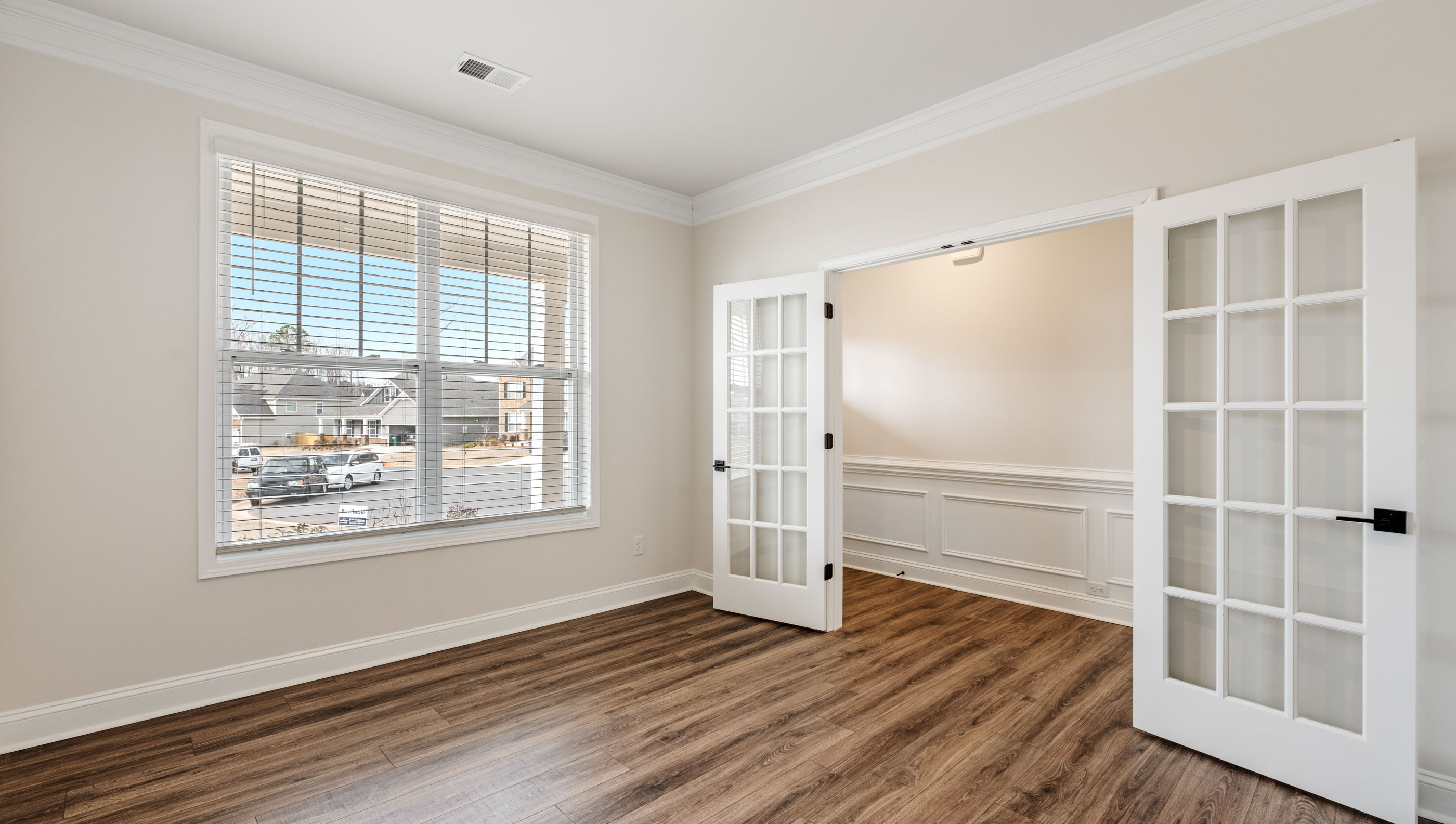 Study with windows and French doors.