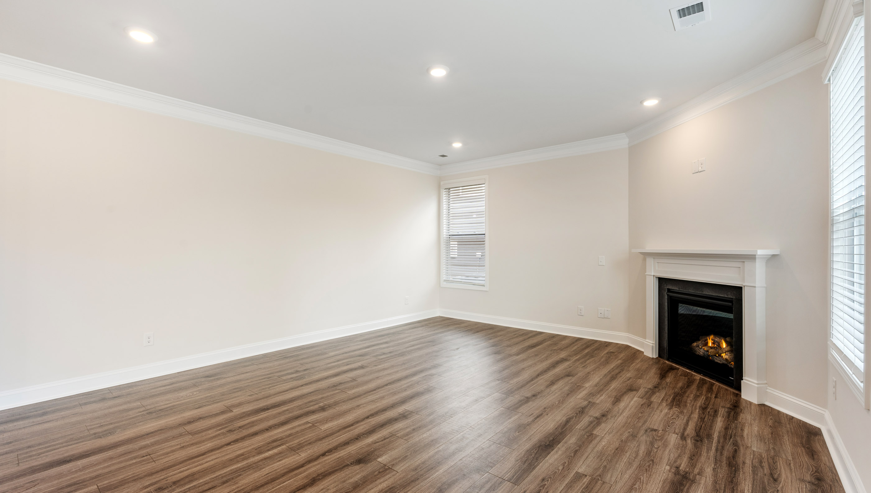 Livingroom with window and firplace.