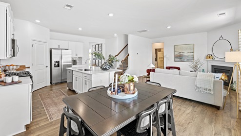 Kitchen and island with granite counter tops.