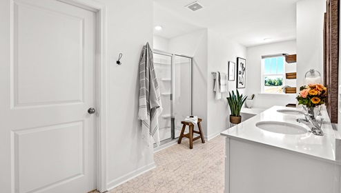 Primary bethroom with shower and tub.