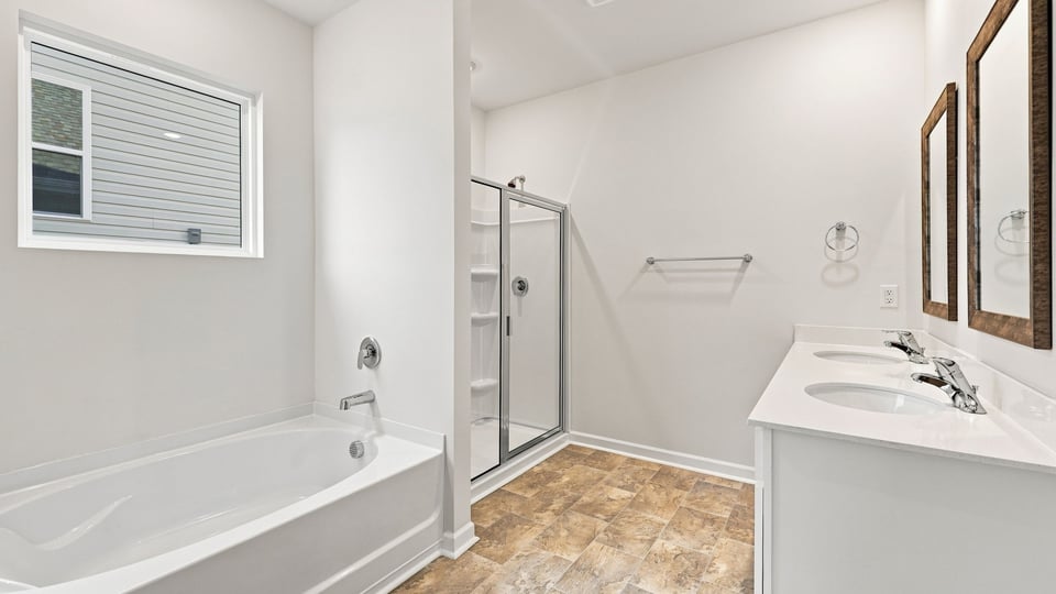 Primary bathroom with double vanity sinks.