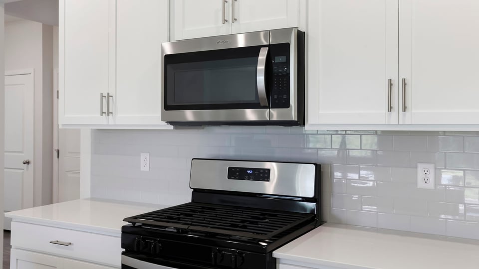 Kitchen with island and countertops.