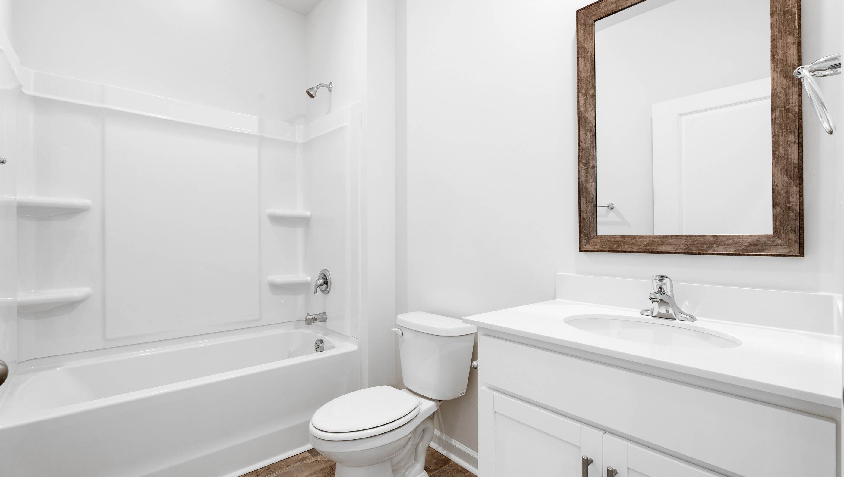 Bathroom with vanity and tub.