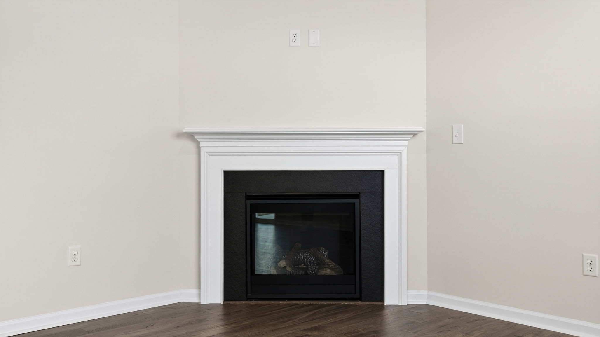 Family room with windows and fireplace.