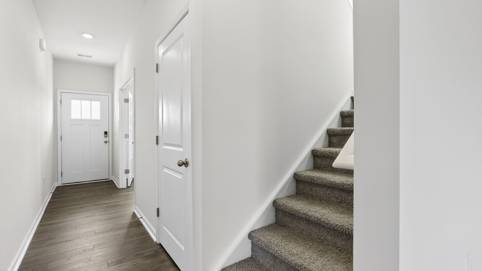 View of hallway and stairs.