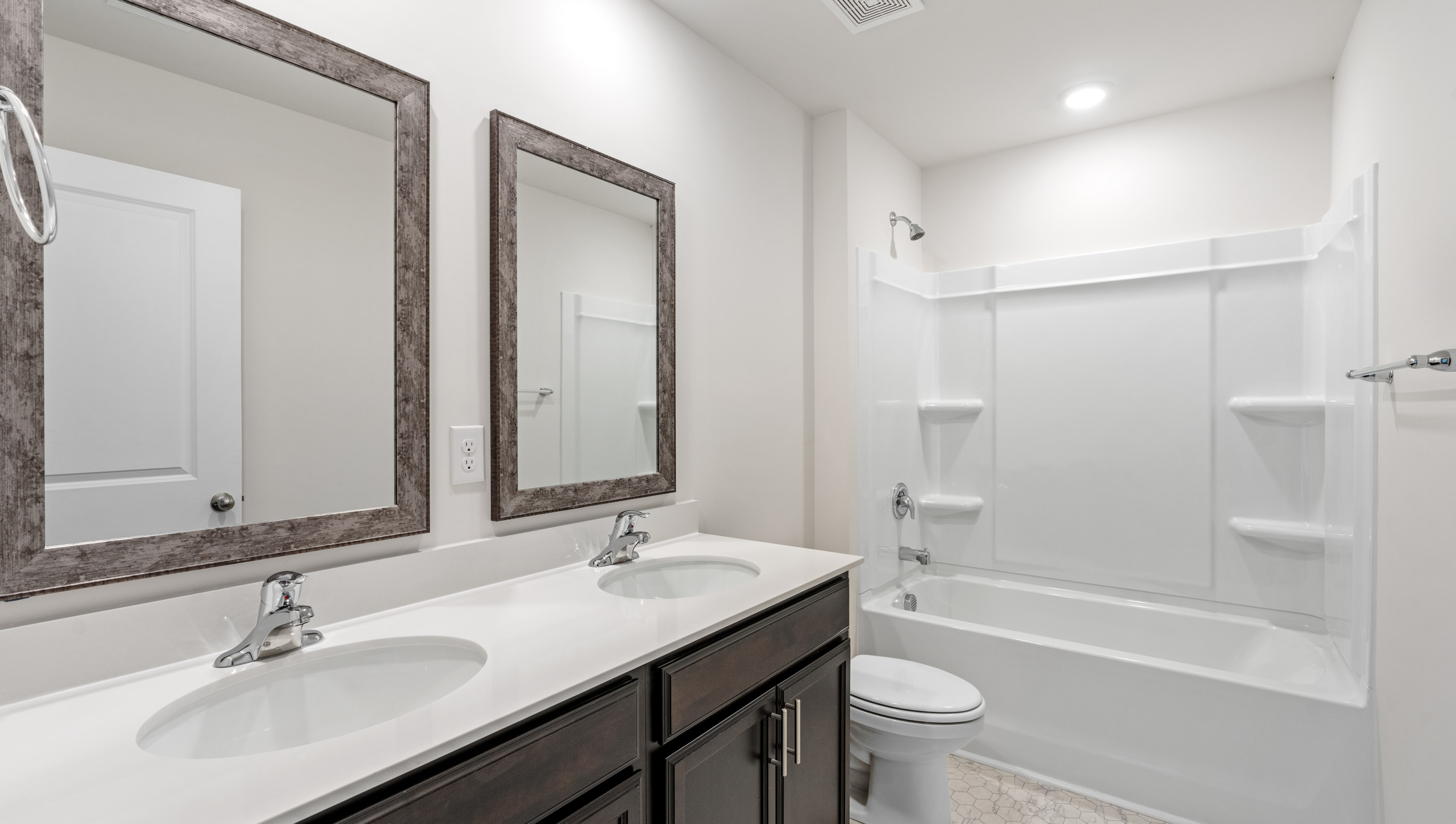 Bathroom with vanity and tub.