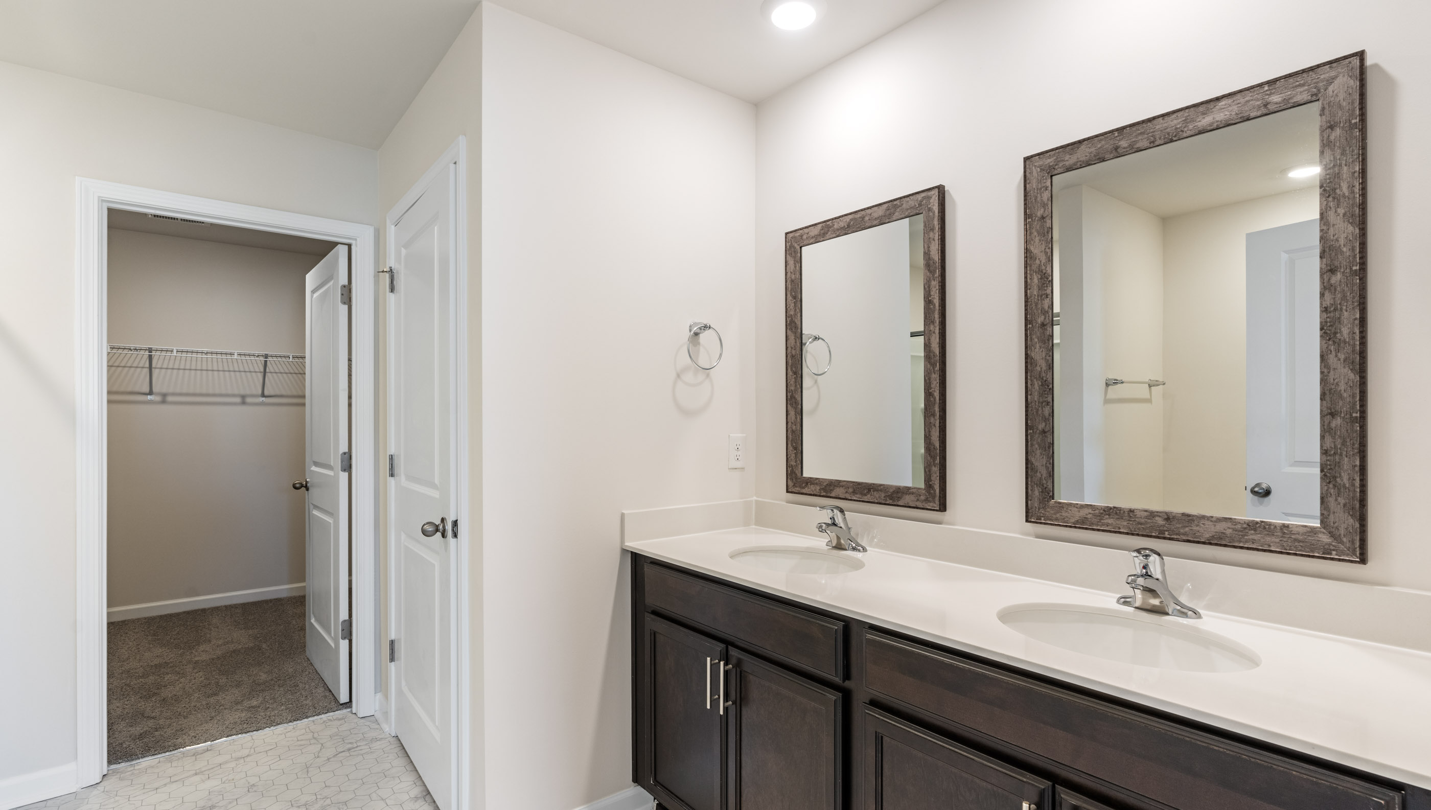 Bathroom with dual vanity.