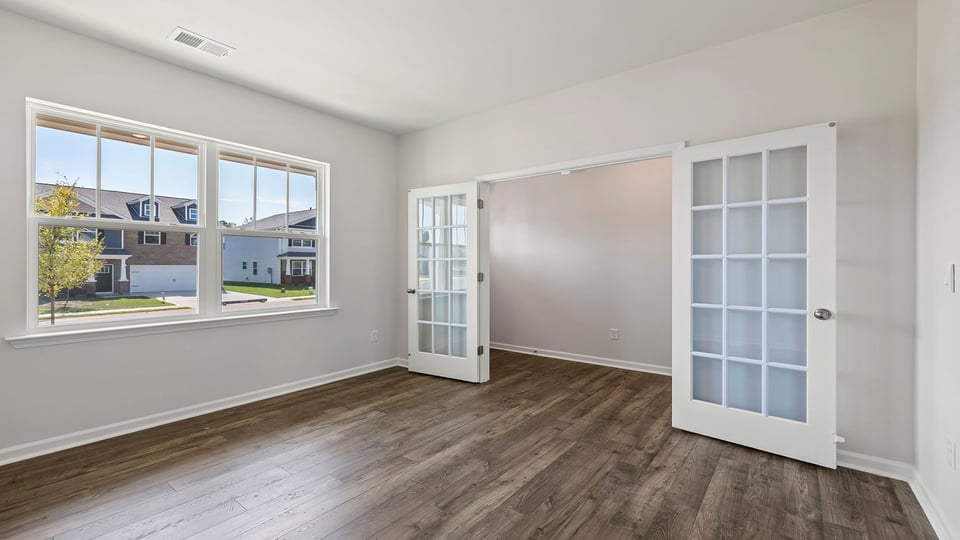 Study with windows and French doors.