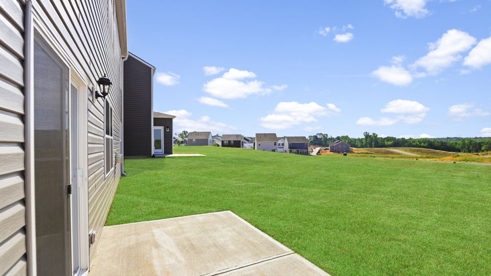 Large backyard of home.