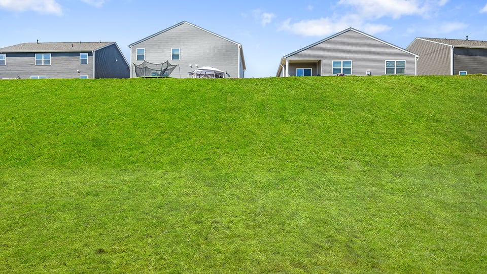 Large backyard of home.