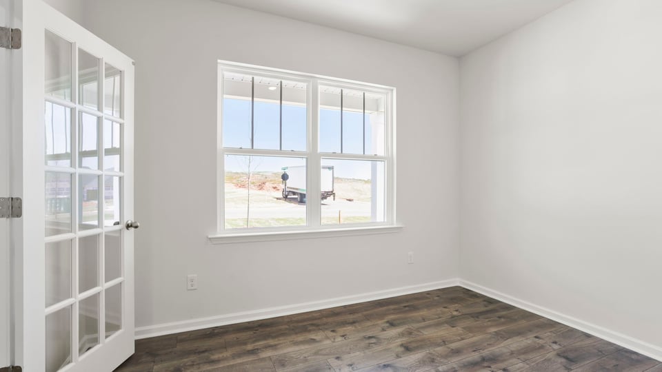 Flex room with french doiors and window.