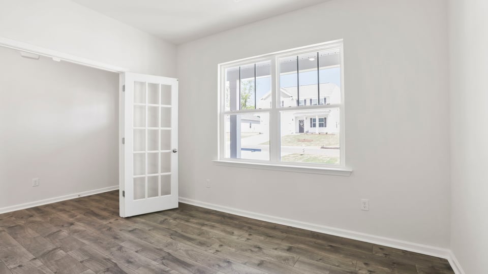 Flex room with french doiors and window.