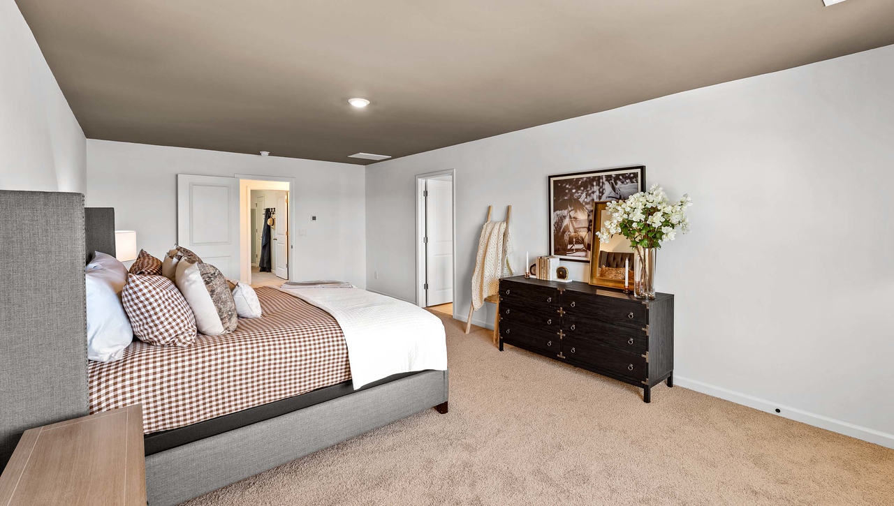 Bedroom with carpet.