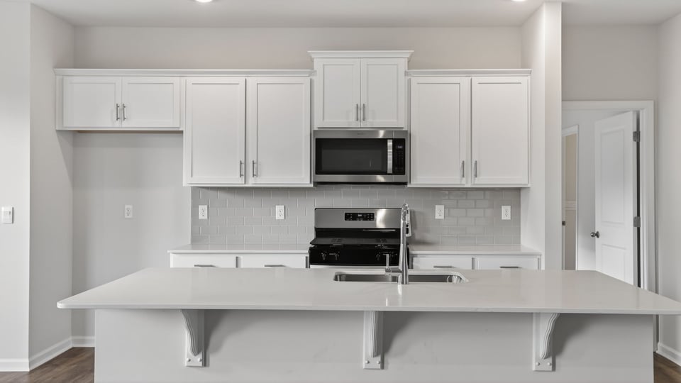 Kitchen with island and countertops..