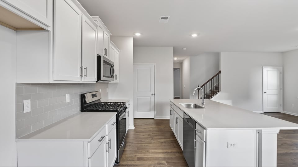 Kitchen with island and countertops..