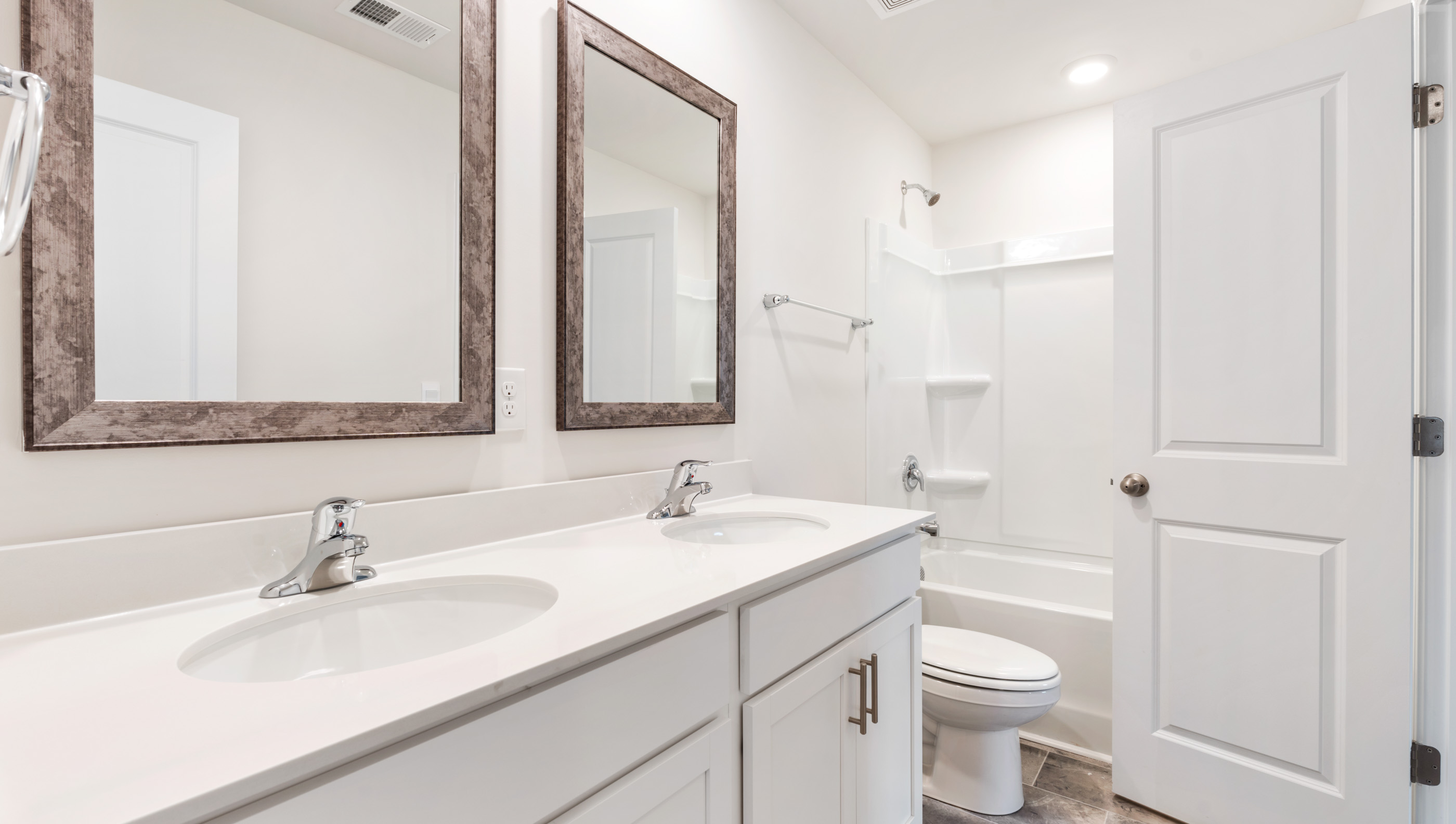 Bathroom with vanity and tub.