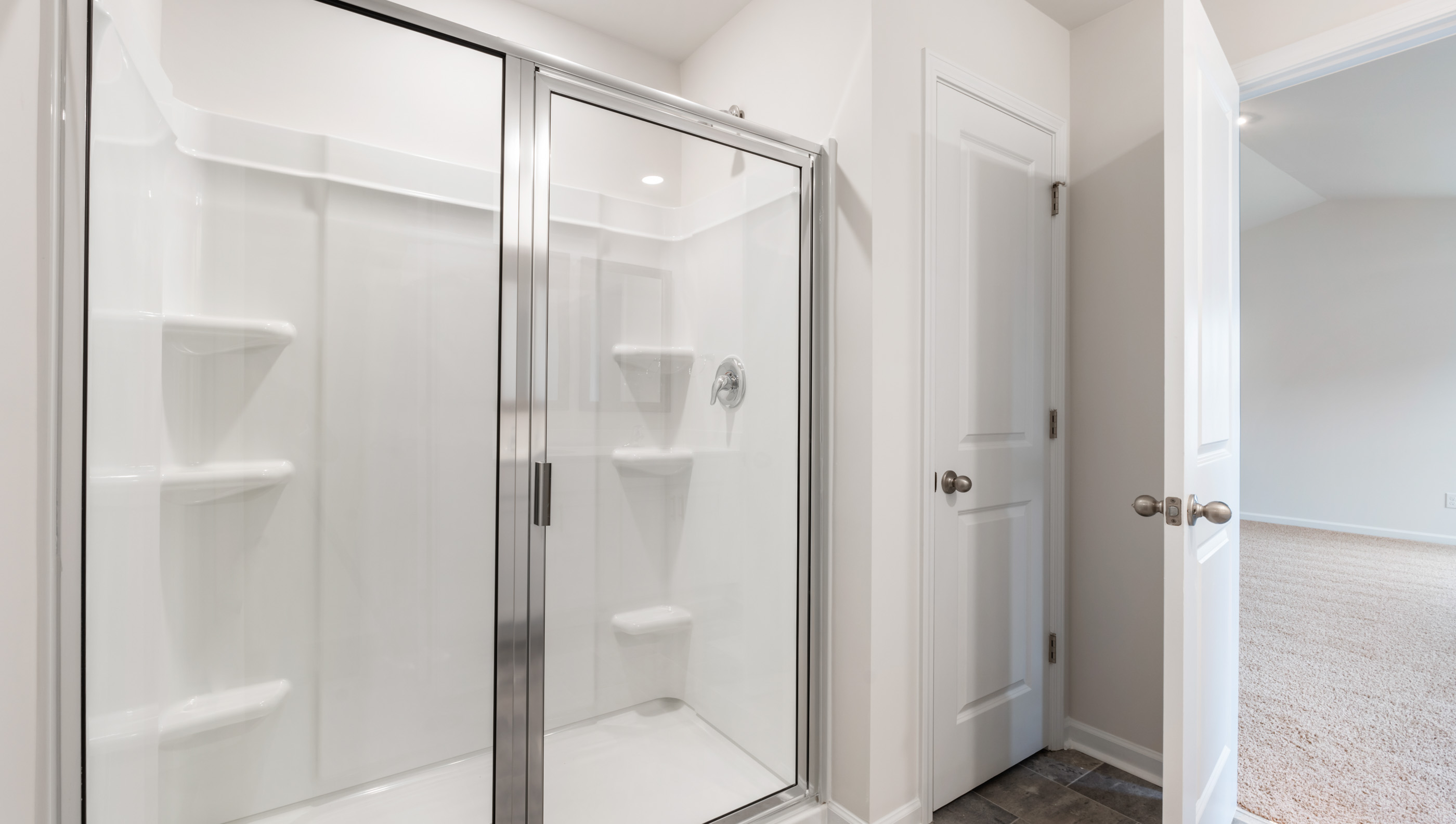 Bathroom with walk in shower.
