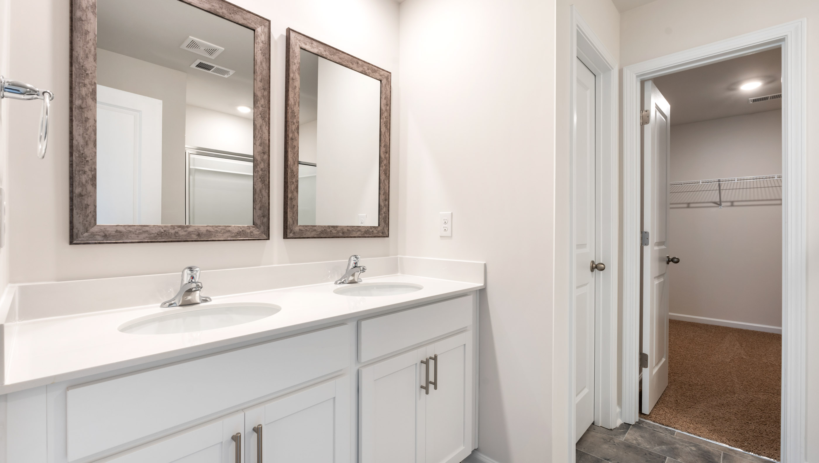 Bathroom with dual vanity.