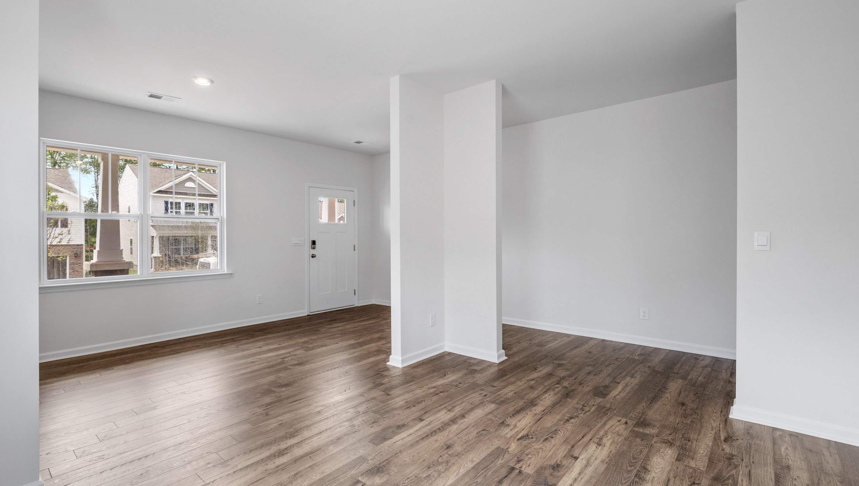 Office and dining room with windows.