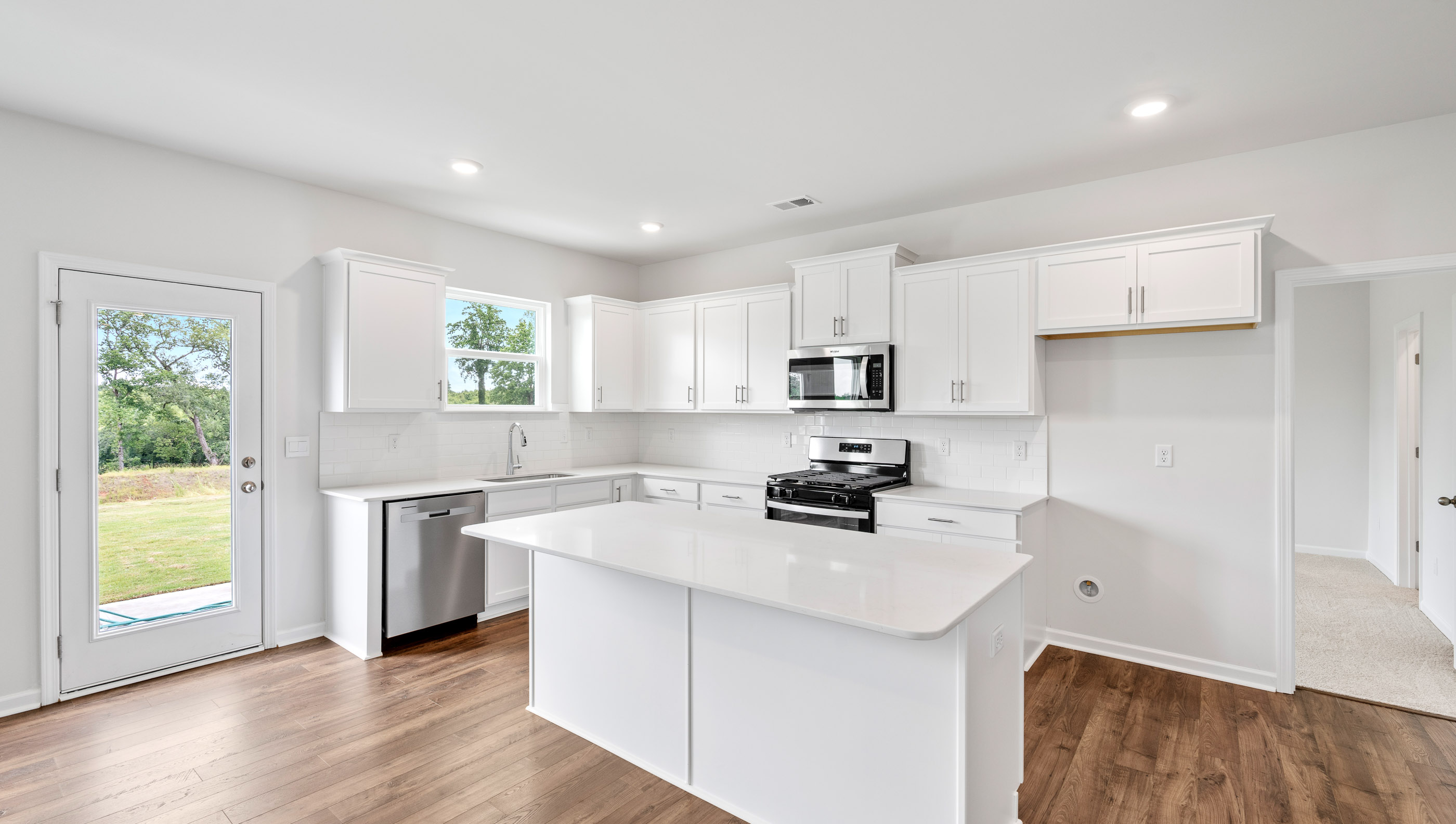 Kitchen with quarts countertops.