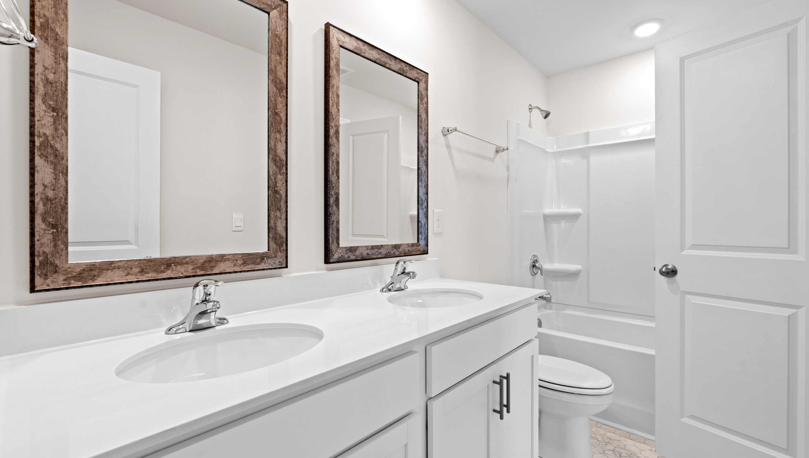 Bathroom with vanity and tub.