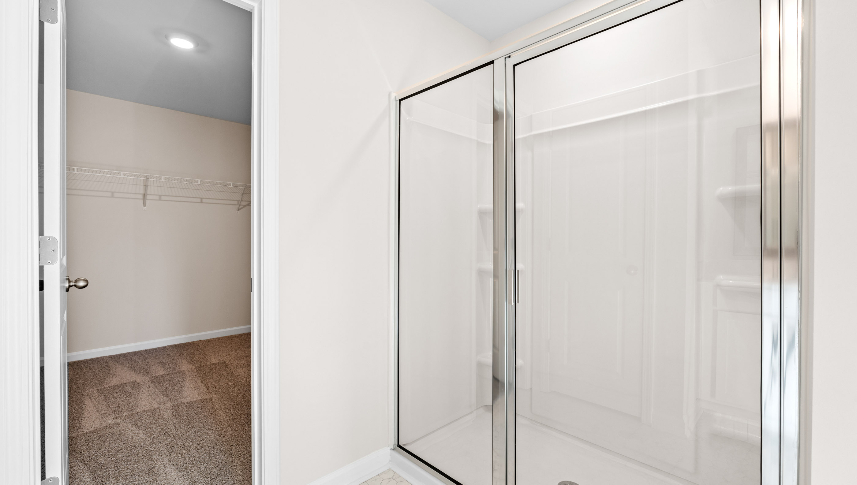 Bathroom with walk in shower.