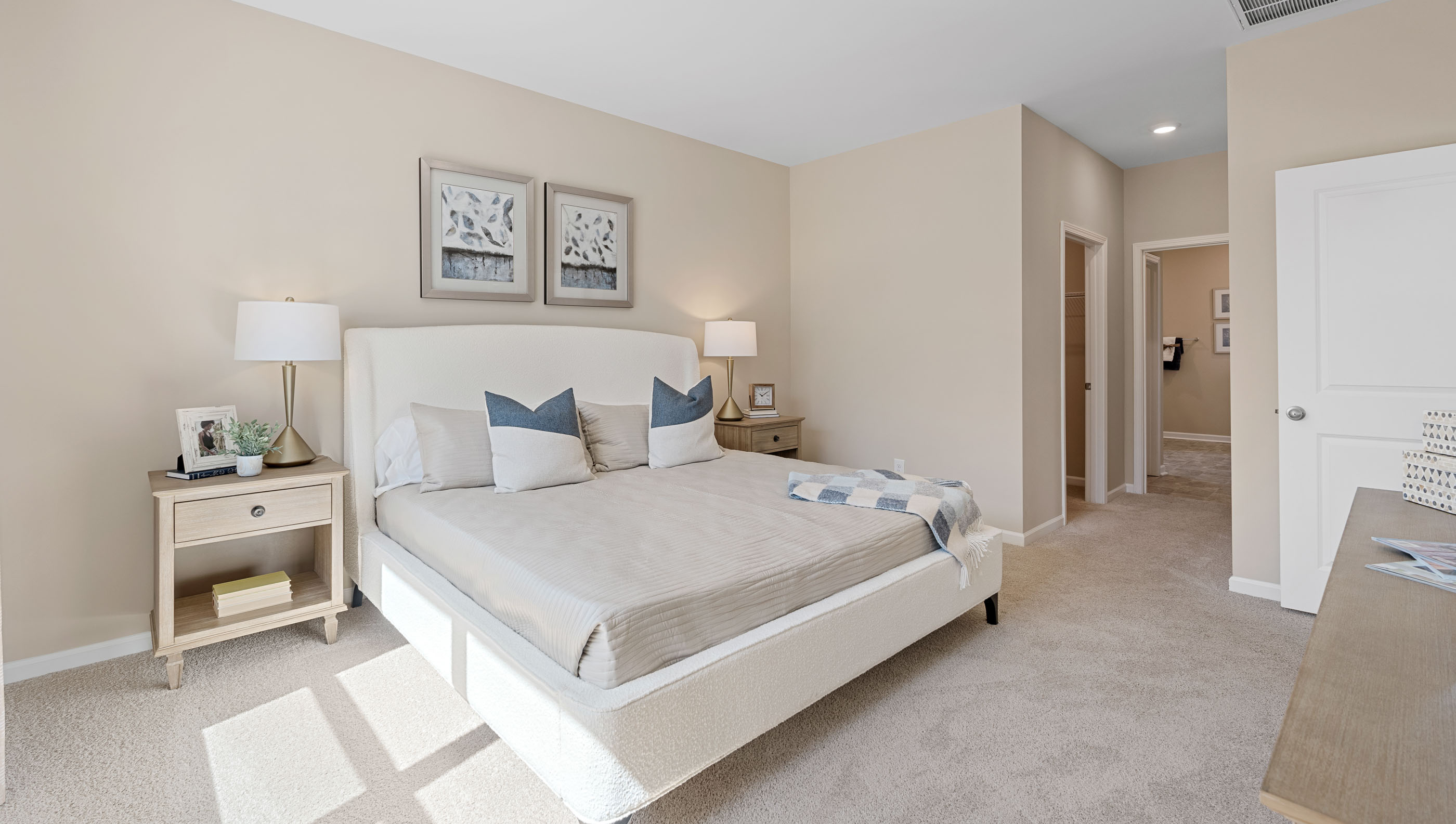 Bedroom with carpet and window.