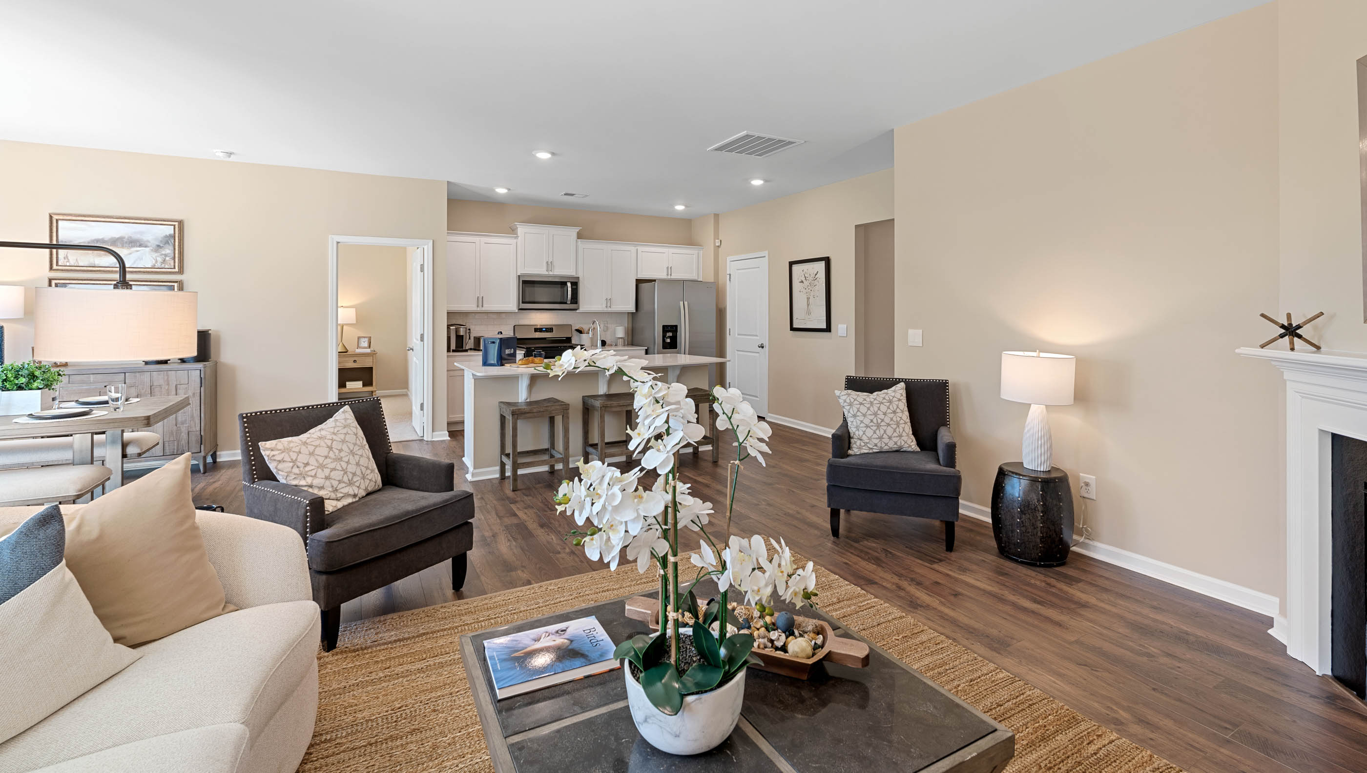 Family room with fireplace and windows.