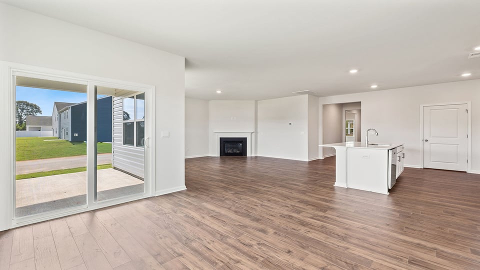 Dining room facing kitchen and living room.