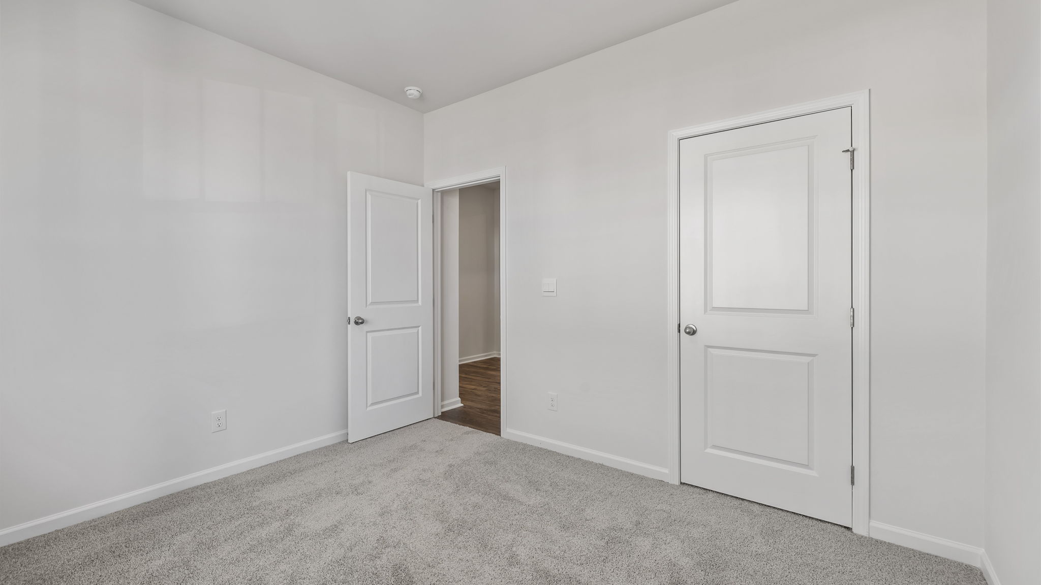 Bedroom with carpet.