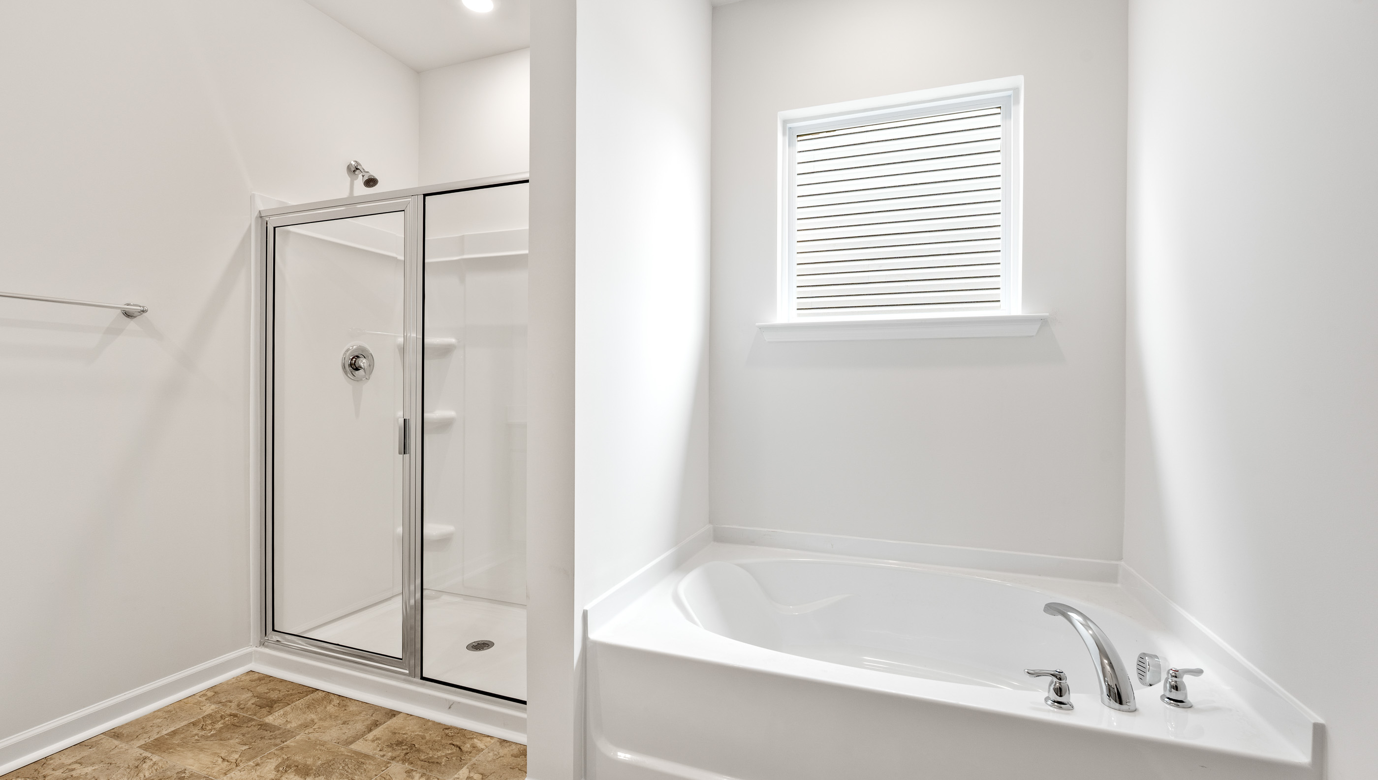 Bathroom with walk in shower.