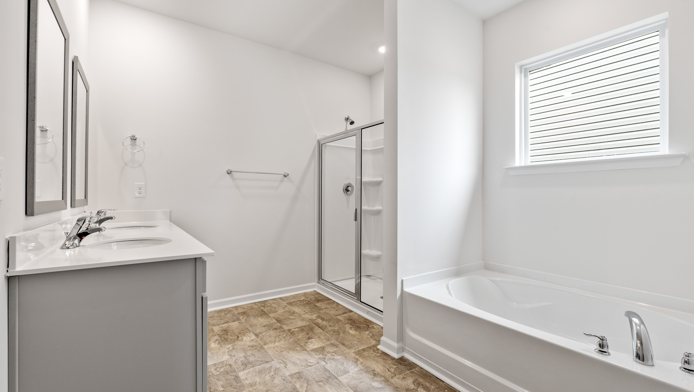 Bathroom with walk in shower.