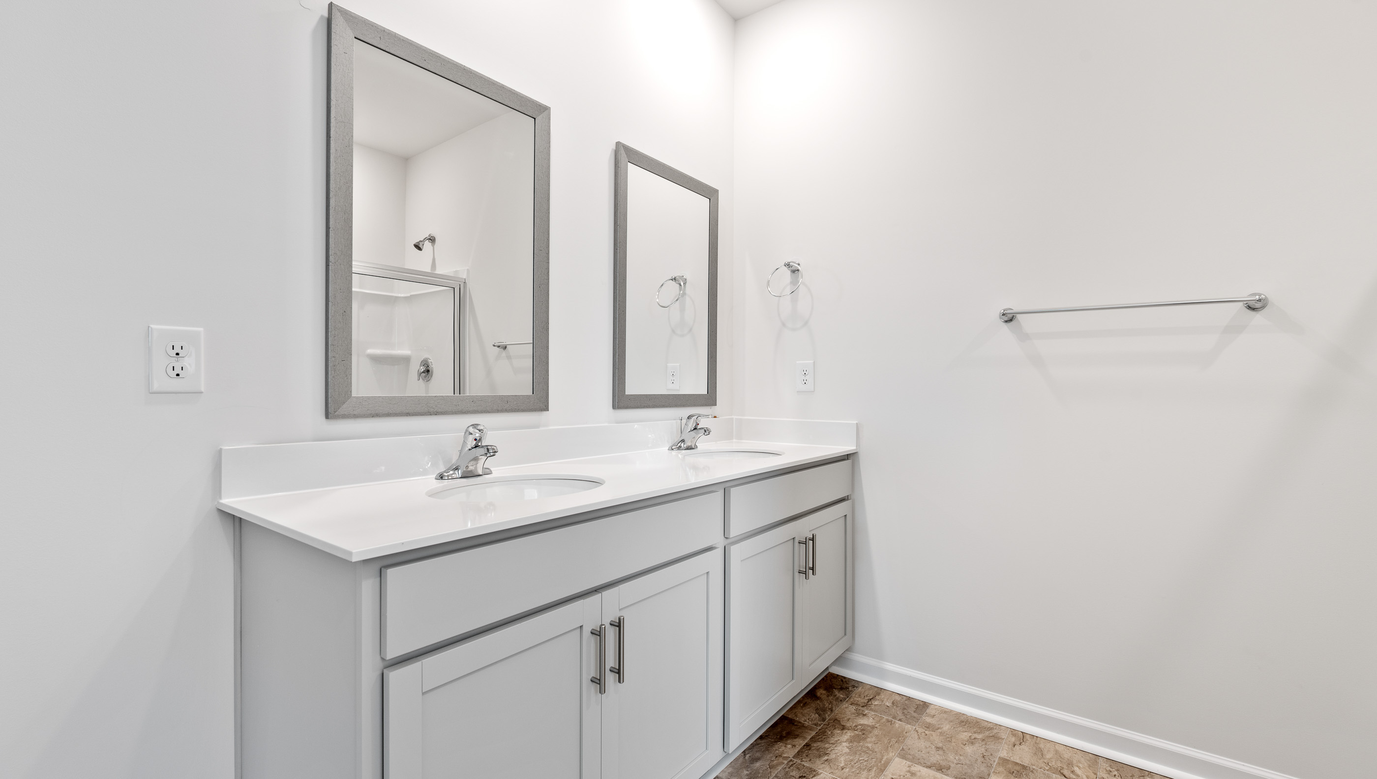 Bathroom with walk in shower.