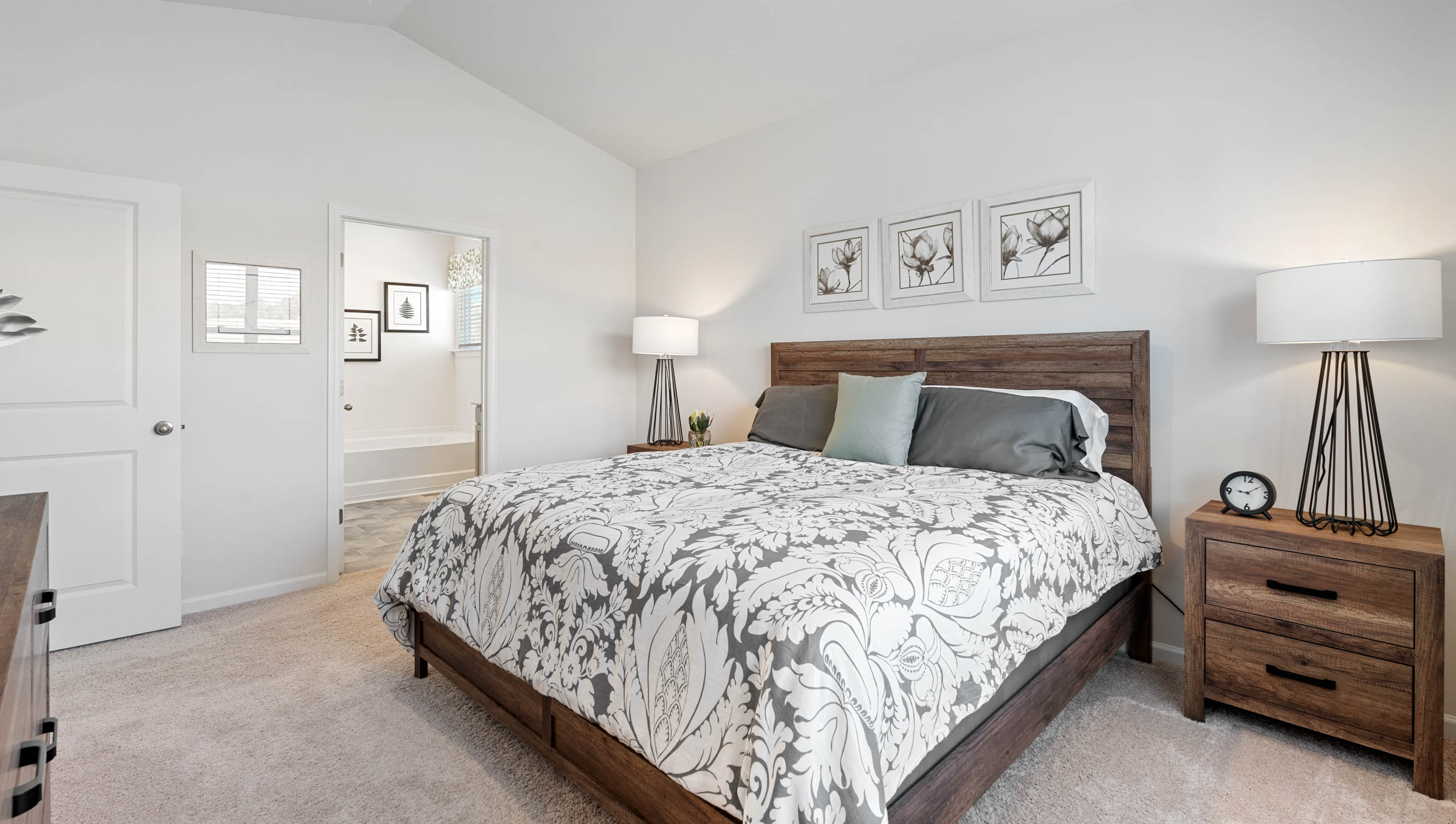 Bedroom with carpet and window.
