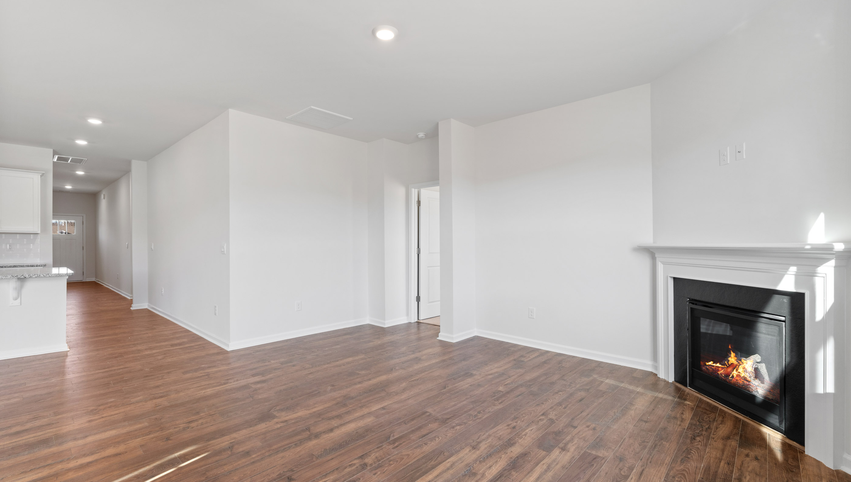 Family room with fireplace.
