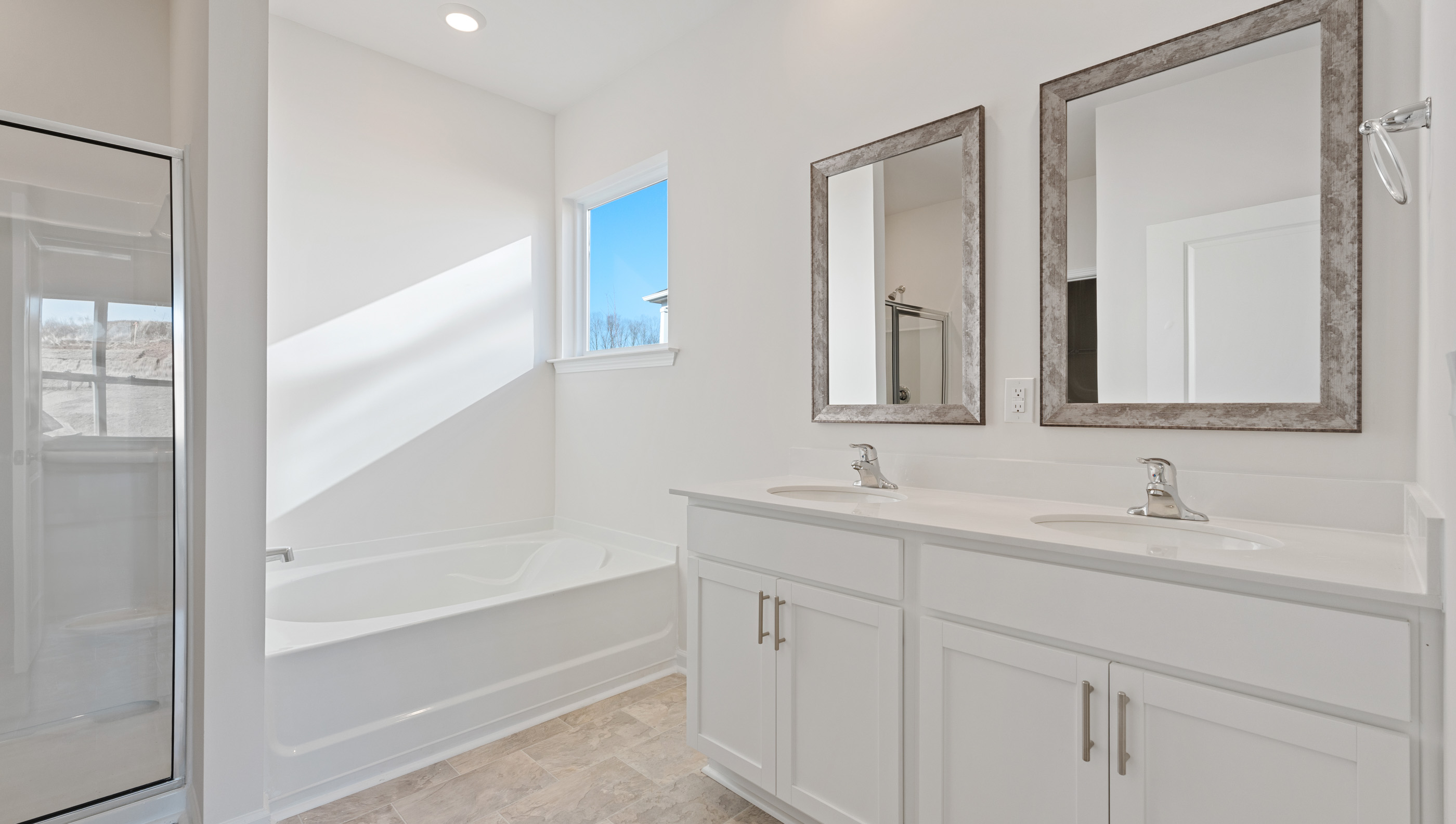 Bathroom with dual vanity.