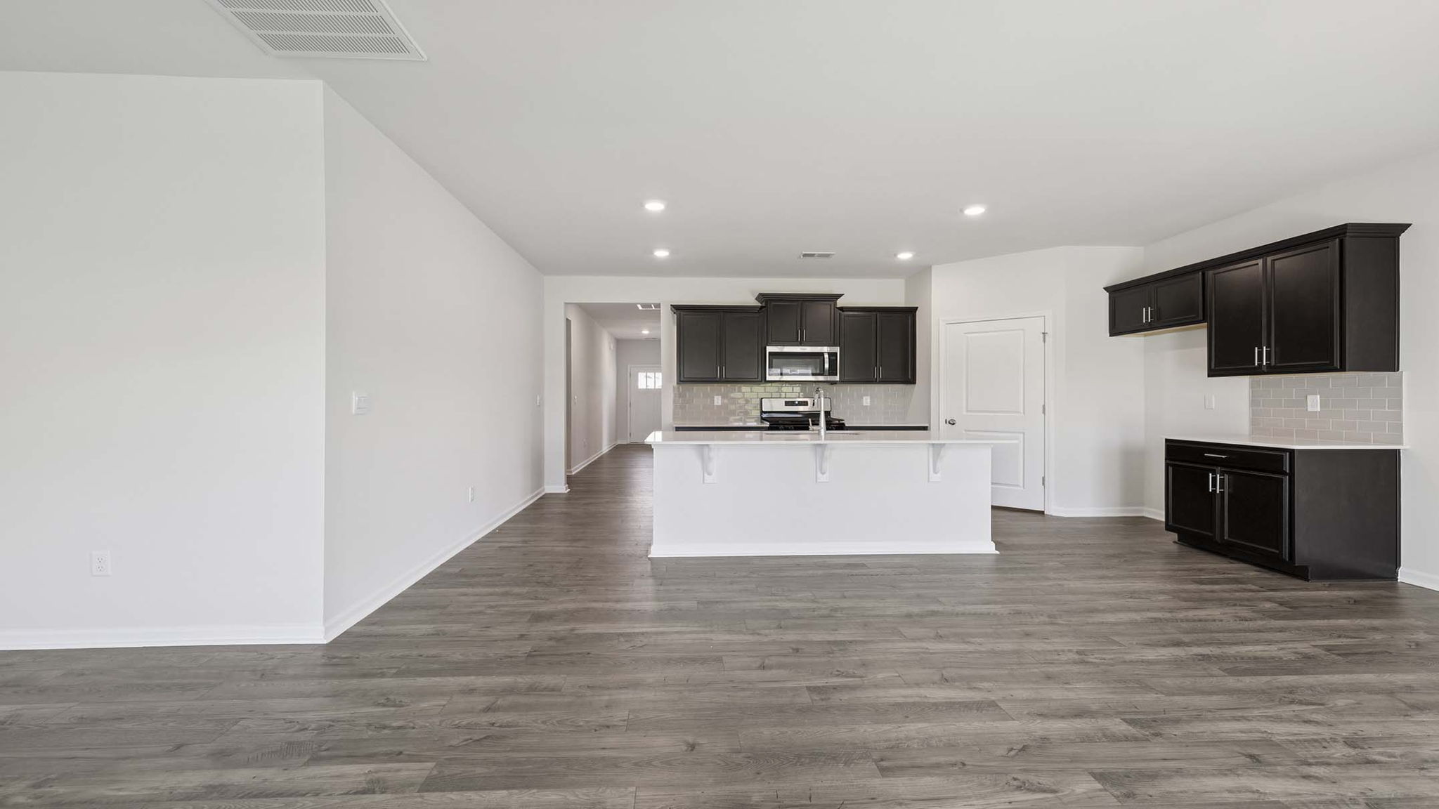 Kitchen with quartz countertops.