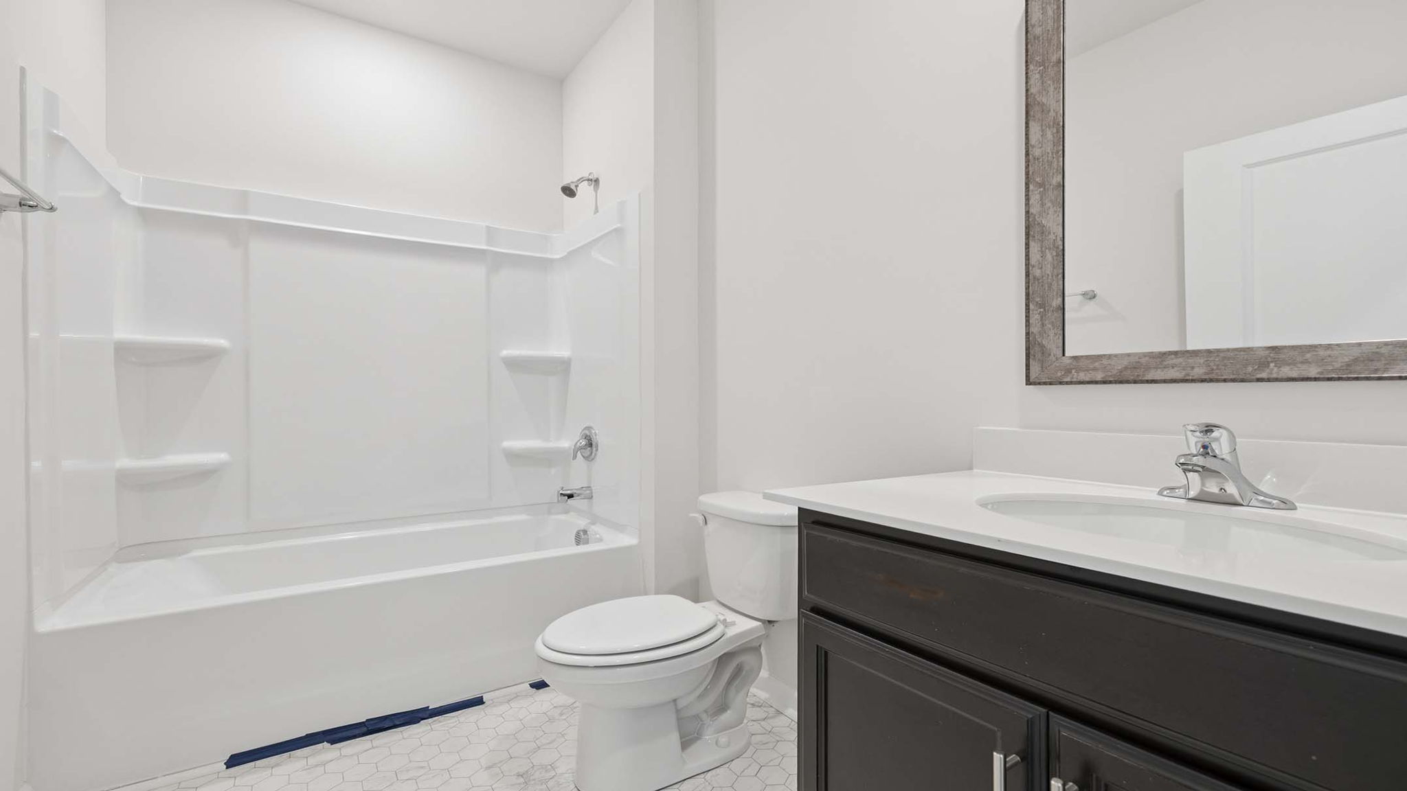 Bathroom with vanity and shower tub