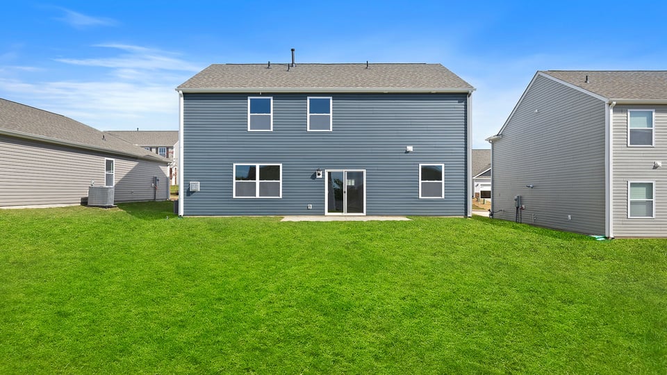 Large backyard of home.