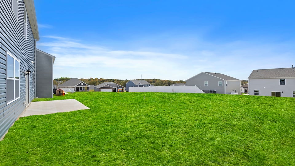 Large backyard of home.