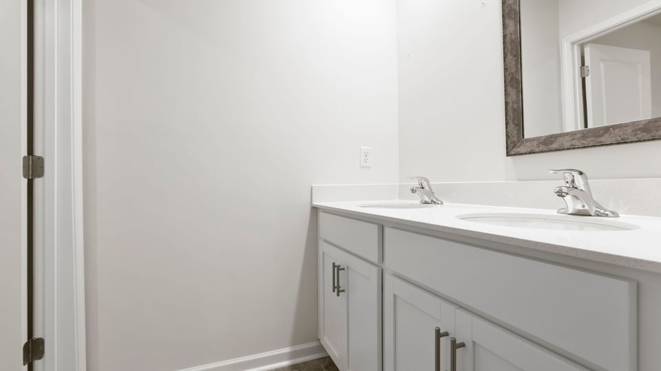 Bathroom with double vanity sink.