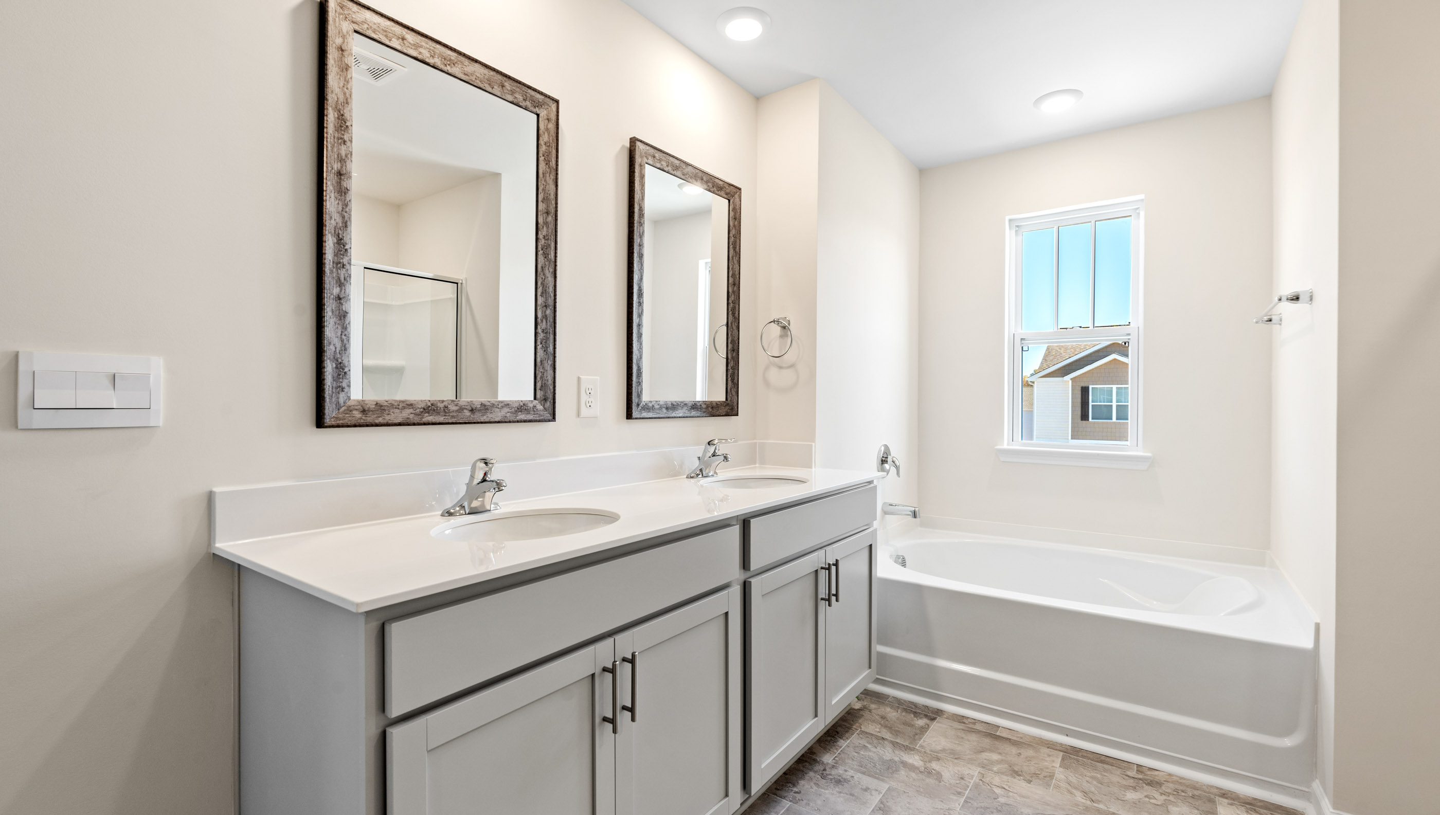 Bathroom with vanity and tub.