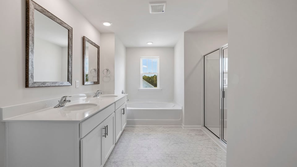 Bathroom with dual vanity.