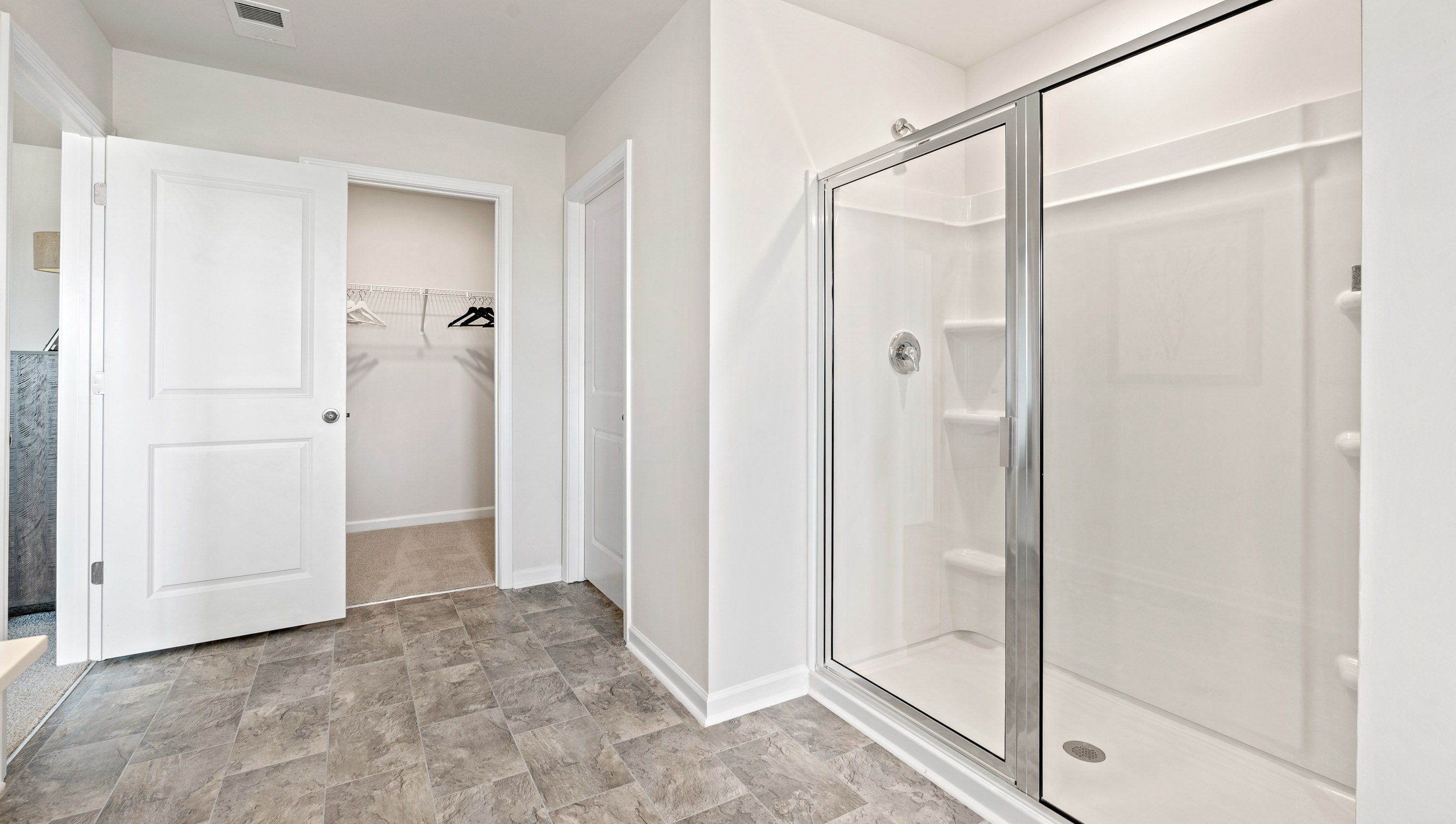 Bathroom with walk in shower.